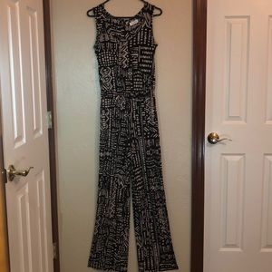 A blacks and beige jumpsuit